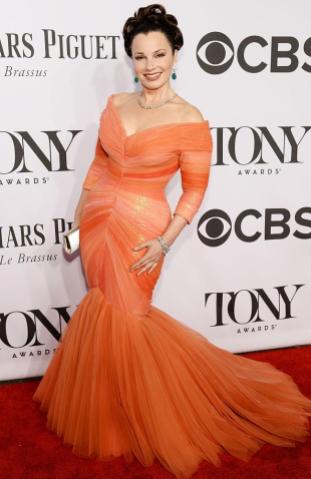 I don't know how I feel about this coral tulle number, but I love Fran Drescher so much, that I am completely bias | Fran Drescher arrives at the 2014 Tony Awards Red Carpet.
