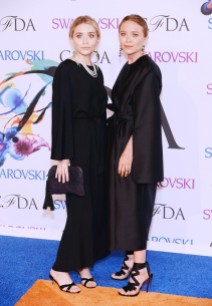 Mary-Kate and Ashley Olsen - both in Sidney Garber jewelry; On Mary-Kate- Christian Louboutin heels.